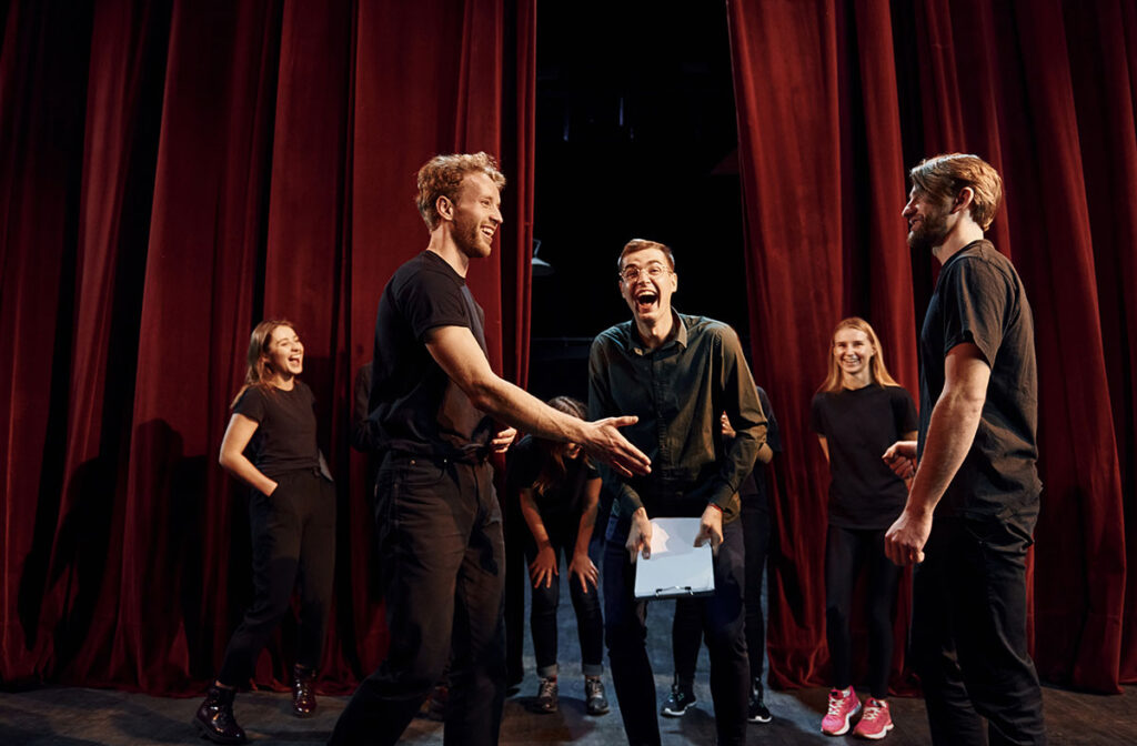 actors rehearsing on stage